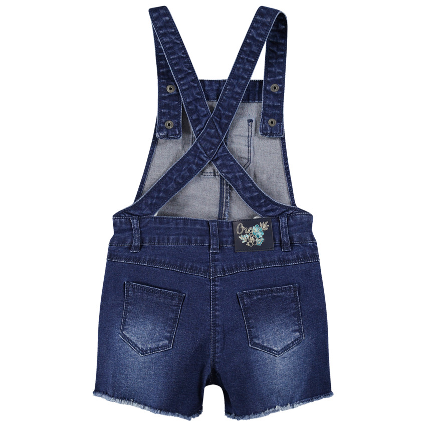 Salopette short en jeans effet used avec papillons brodés 