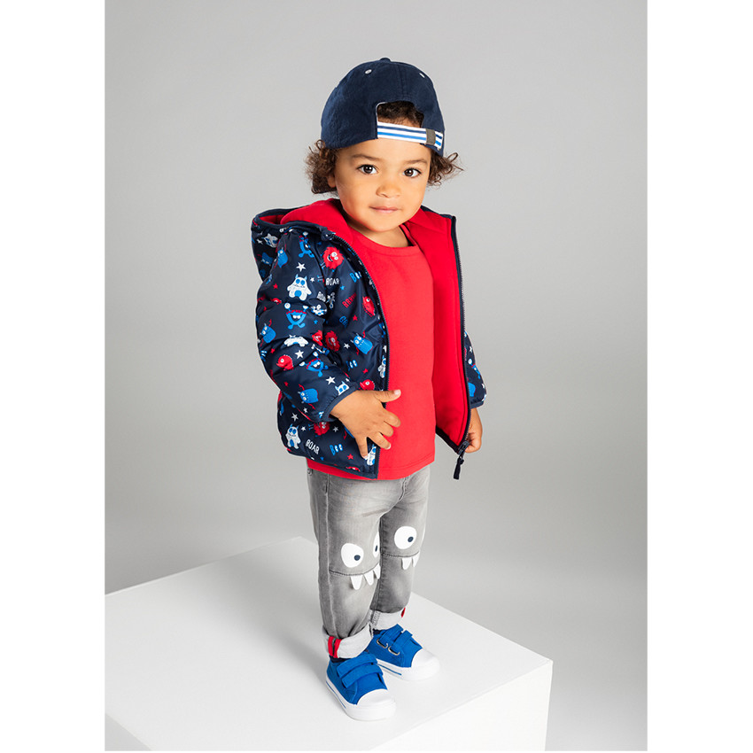 Jean gris effet used et crinkle avec monstres printés sur les genoux 