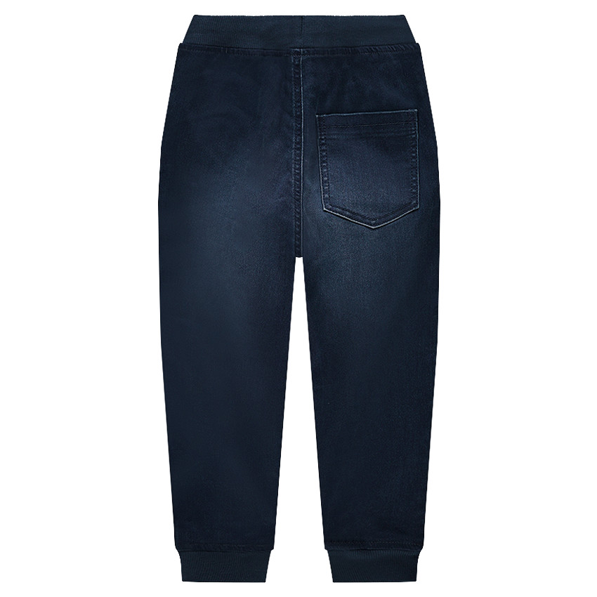 Jeans en molleton effet denim used avec badges 