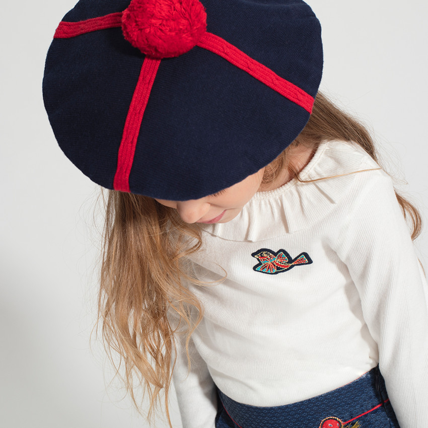 Béret en tricot avec motifs jacquard et pompon 