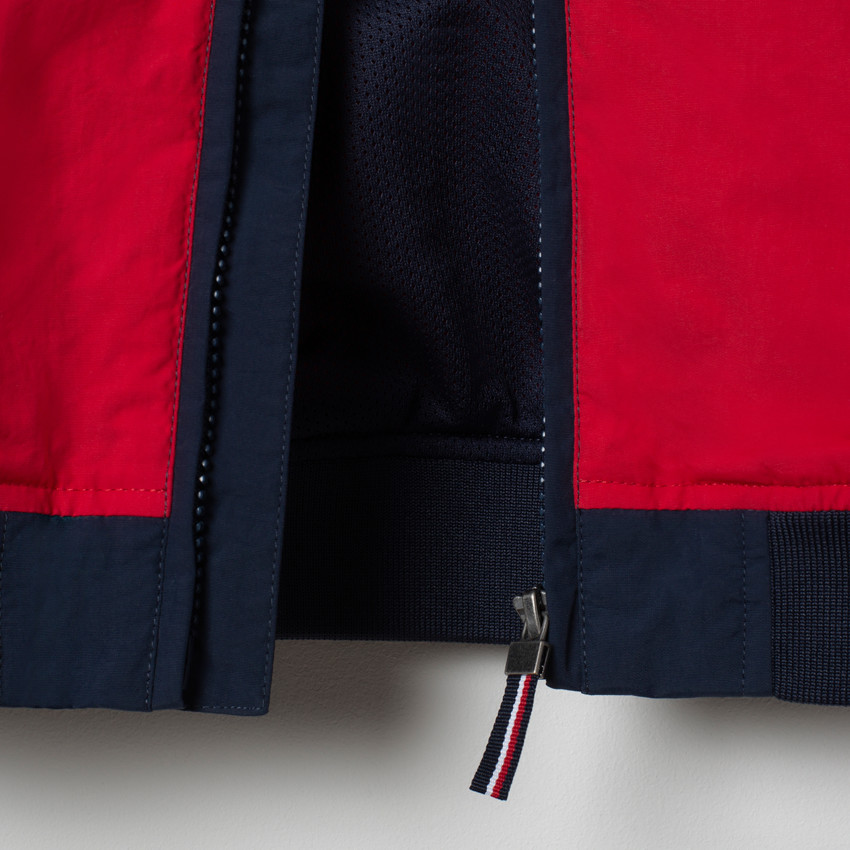 Coupe-vent à capuche tricolore doublé mesh 