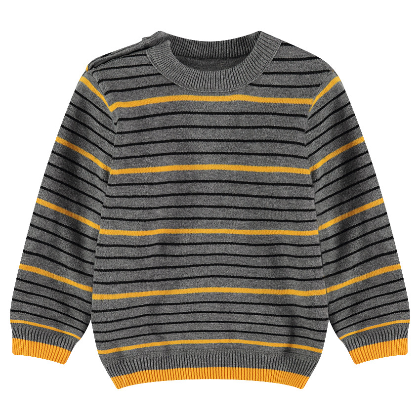 Pull en tricot réversible avec 1 côté uni motif jacquard et 1 côté rayé 