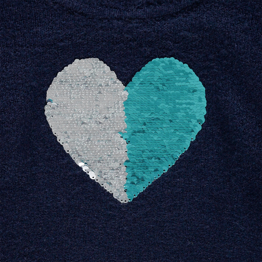 Pull en tricot col roulé avec coeur en sequins magiques 