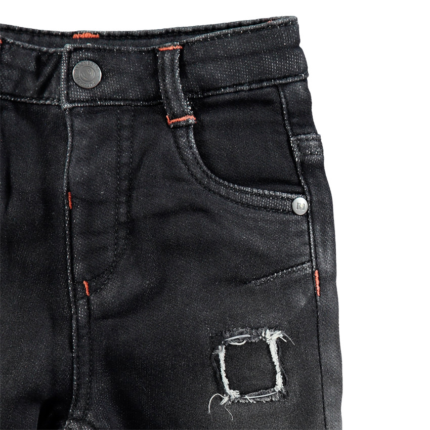 Jean effet used et crinkle avec surpiqûres contrastées 