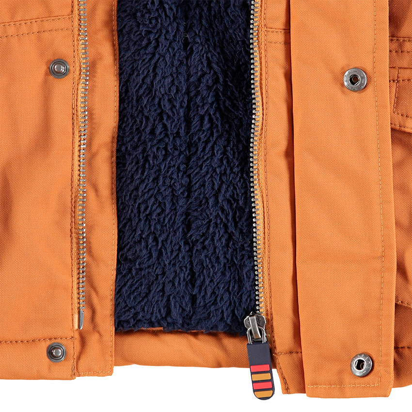 Parka en coton enduit doublée sherpa avec poches à rabat 
