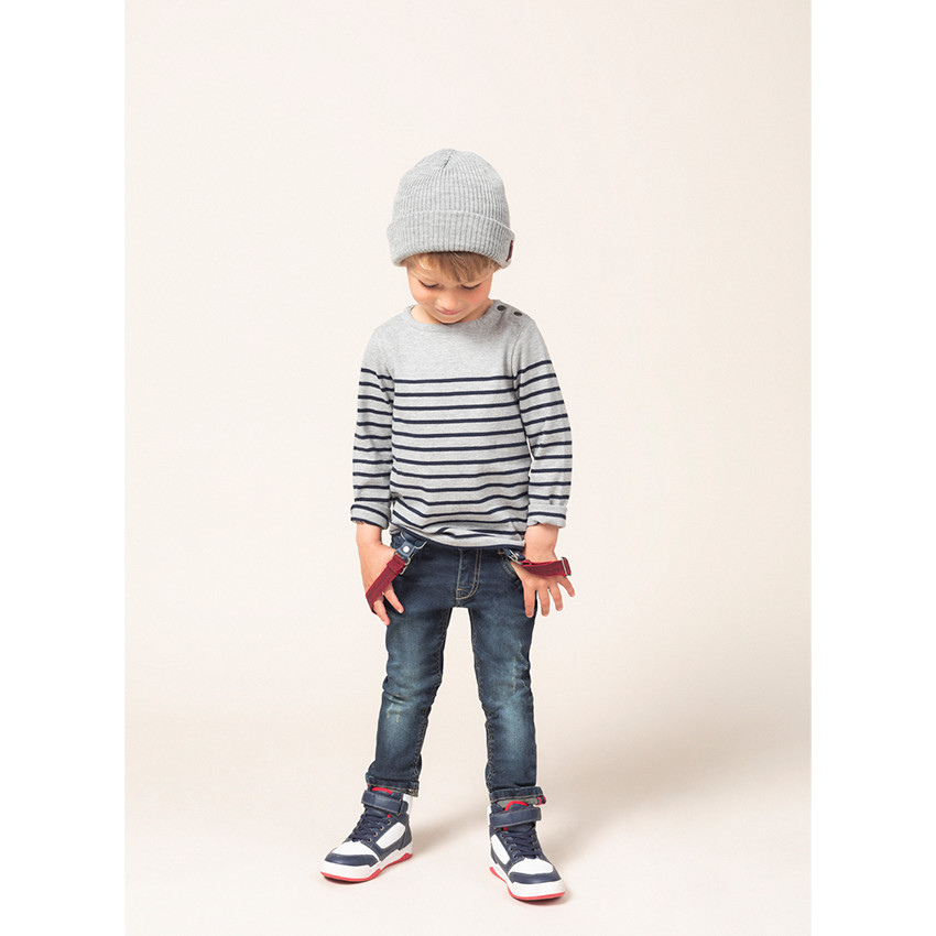 Jeans effet used avec bretelles élastiquées amovibles 