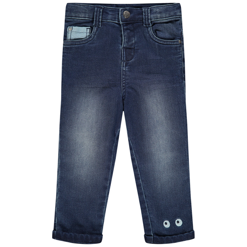 Jean effet used doublé jersey à yeux brodés 