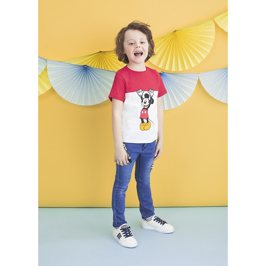 Jean slim effet used à badges Mickey Disney 