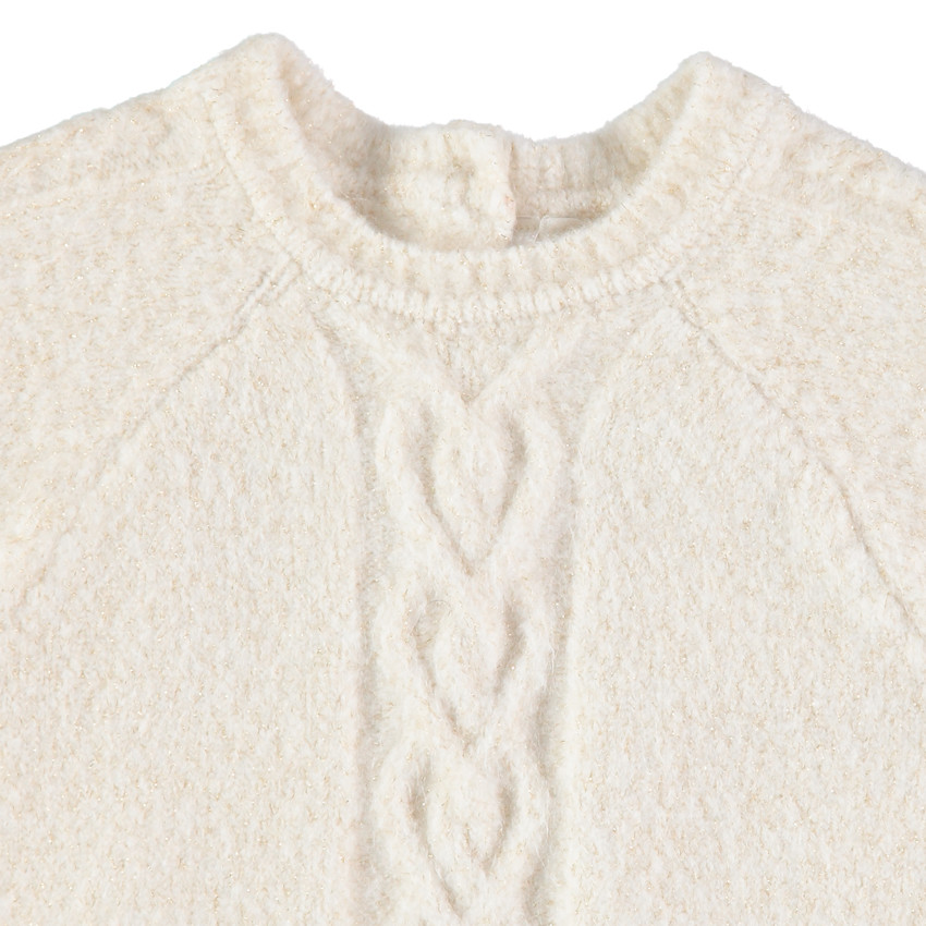 Pull en tricot torsadé à pans arrondis 