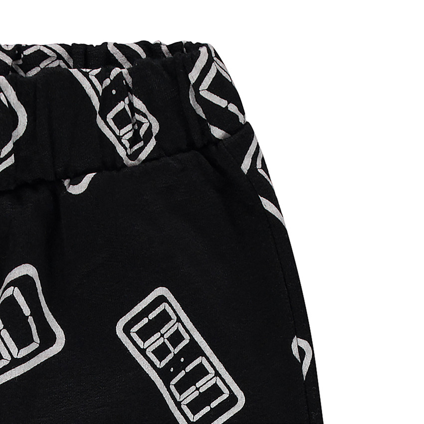 Junior - Pyjama en jersey avec message printé et pantalon imprimé all-over 