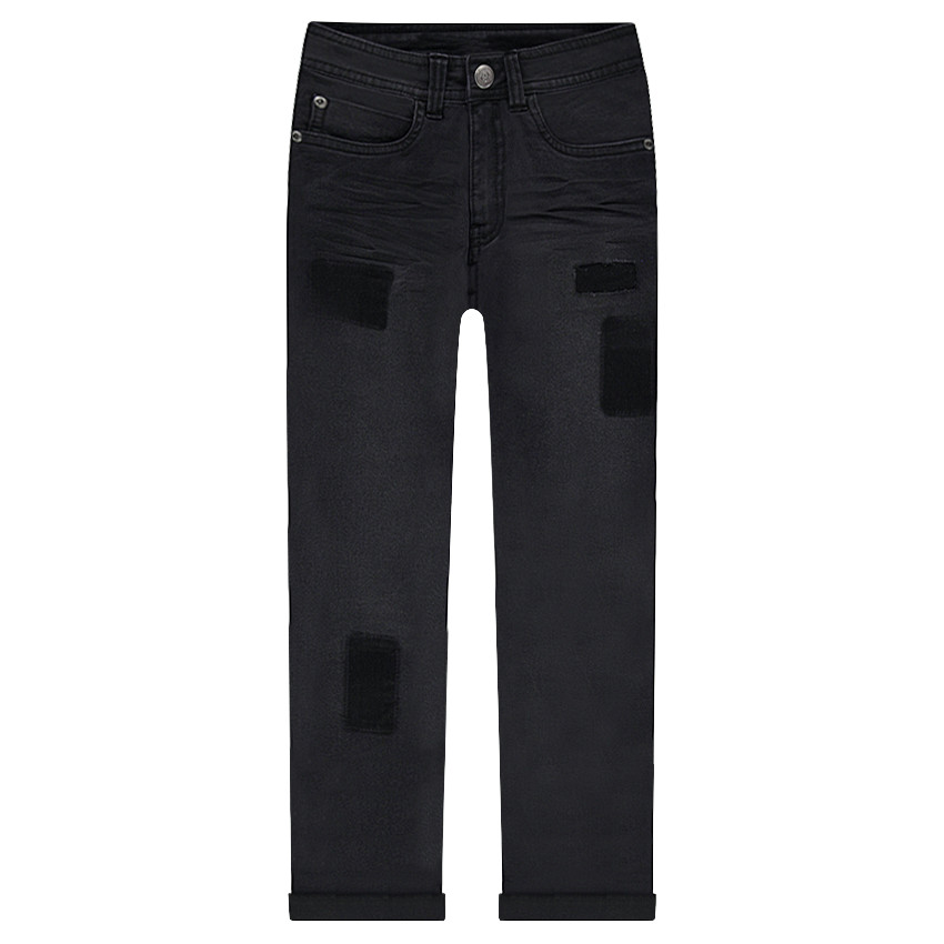 Jeans effet used et crinkle avec ombres de patchs 