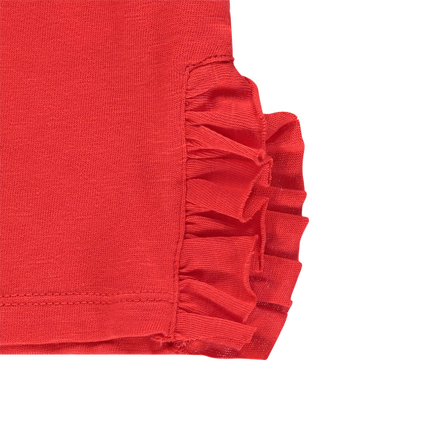 Tee-shirt manches longues volanté avec pompons sous empiècement en résille 