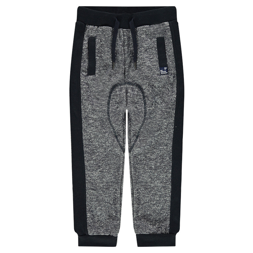 Pantalon de jogging en molleton twisté avec poches passepoilées 