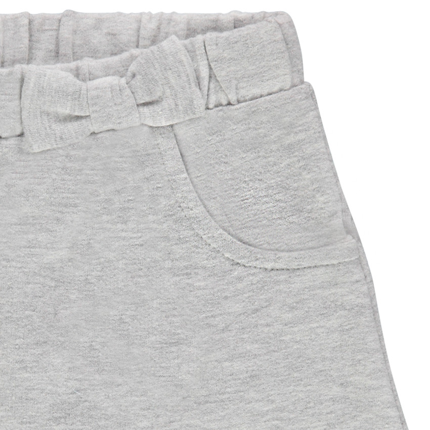 Pantalon de jogging en molleton uni avec nuage printé sur les genoux 