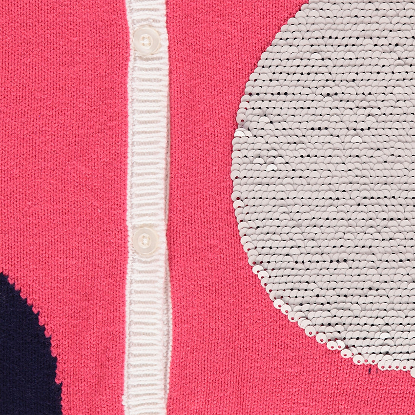 Gilet en tricot avec pois en sequins magiques 