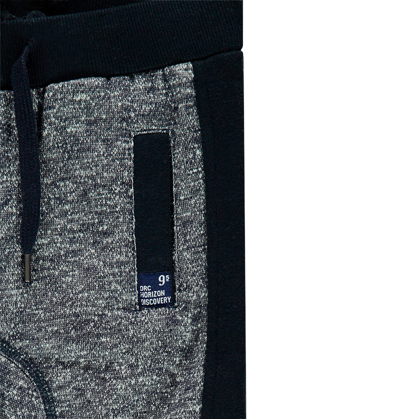 Pantalon de jogging en molleton twisté avec poches passepoilées 