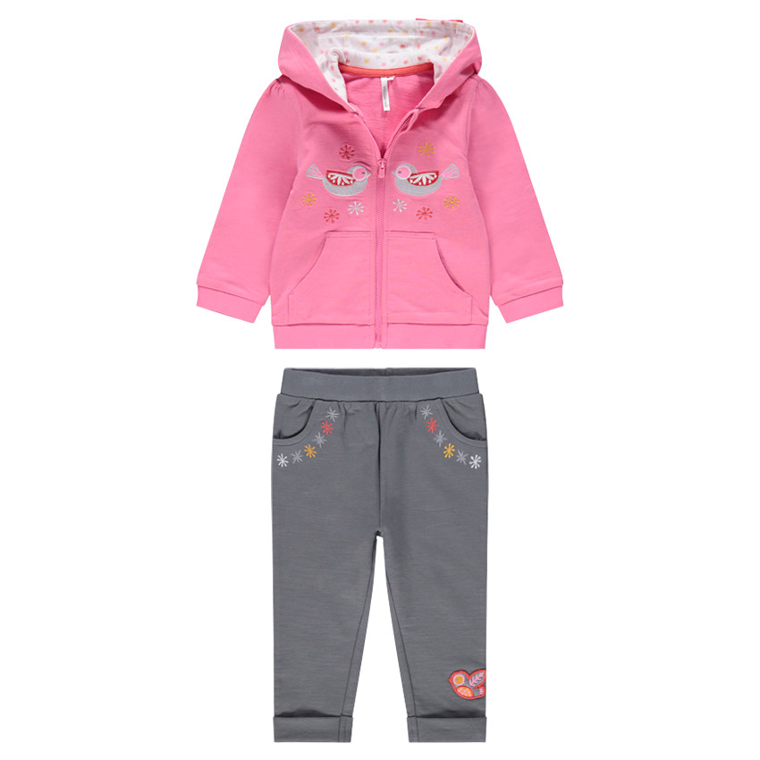 Jogging bicolore en molleton avec motifs brodés.  