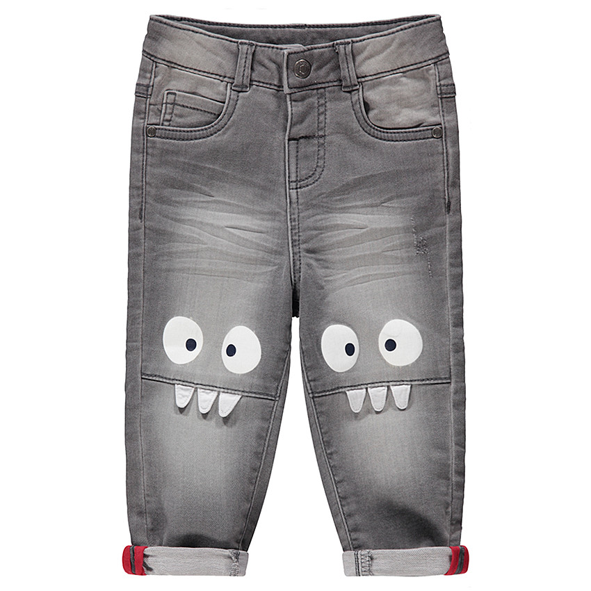 Jean gris effet used et crinkle avec monstres printés sur les genoux 