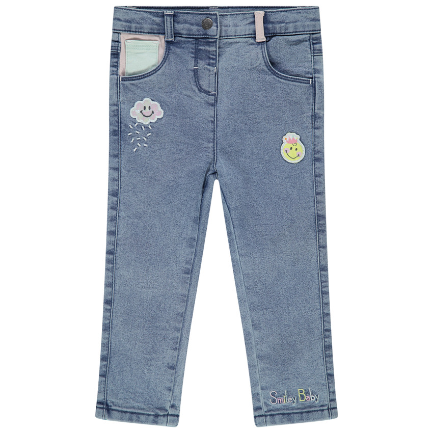 Jean slim effet used à badges Smiley 