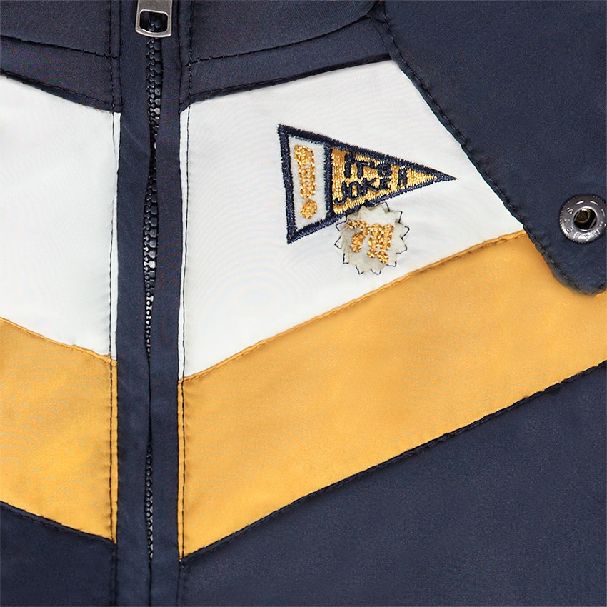 Doudoune matelassée à capuche doublée micropolaire avec badge brodé 