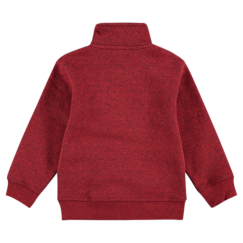 Gilet en molleton avec ouverture en biais et poches zippées 