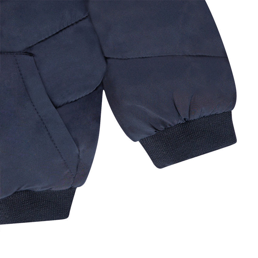 Doudoune matelassée à capuche doublée micropolaire avec badge brodé 