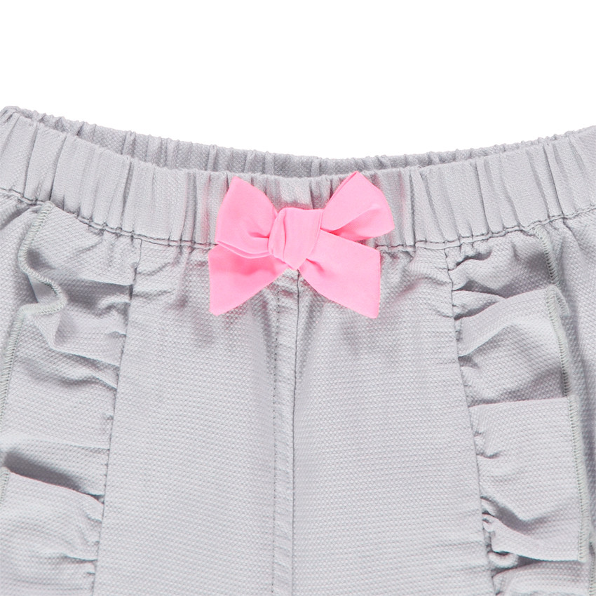 Ensemble avec tunique sans manches rayée et pantalon à volants 