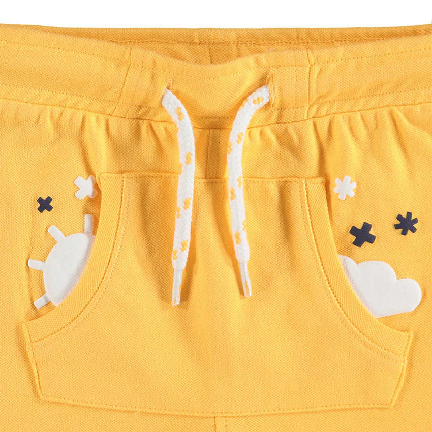 Bermuda en coton piqué avec poche kangourou et prints 