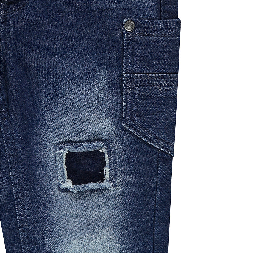 Jeans en denim like effet used avec déchirures et poches 