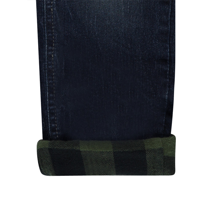 Jeans effet used doublé flanelle à carreaux 