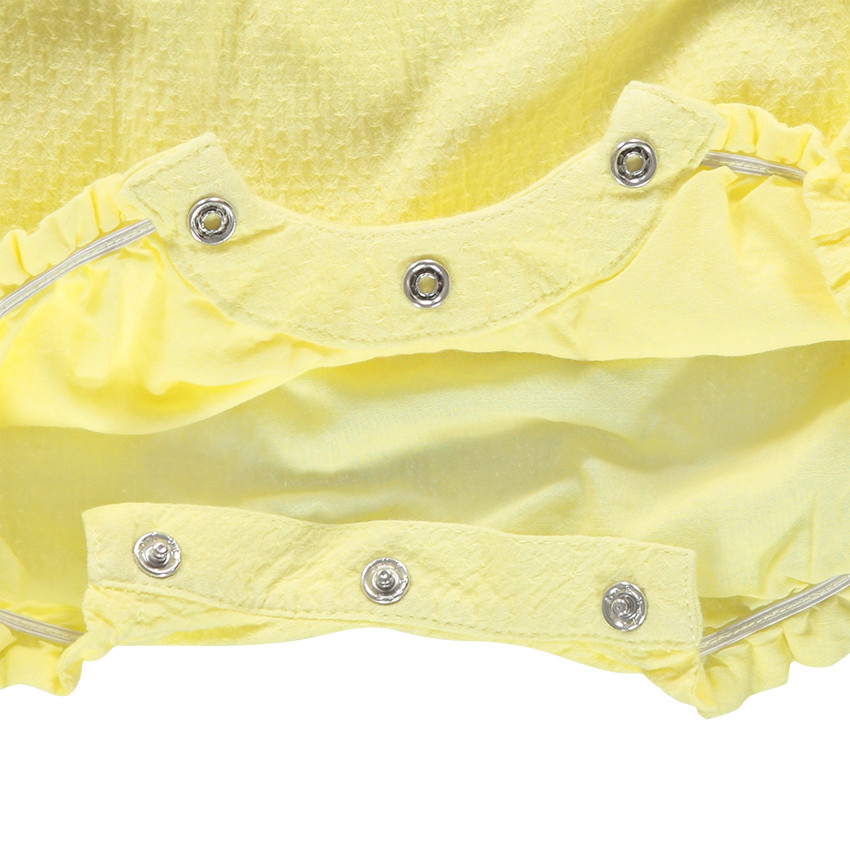 Combinaison courte avec volants et print fantaisie 