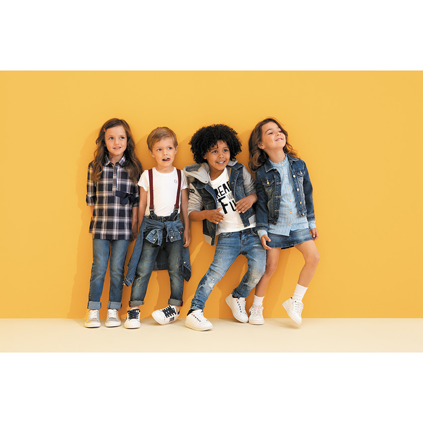 Jeans effet used avec bretelles élastiquées amovibles 