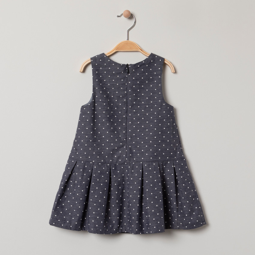 Robe sans manches à pois all-over et noeud  