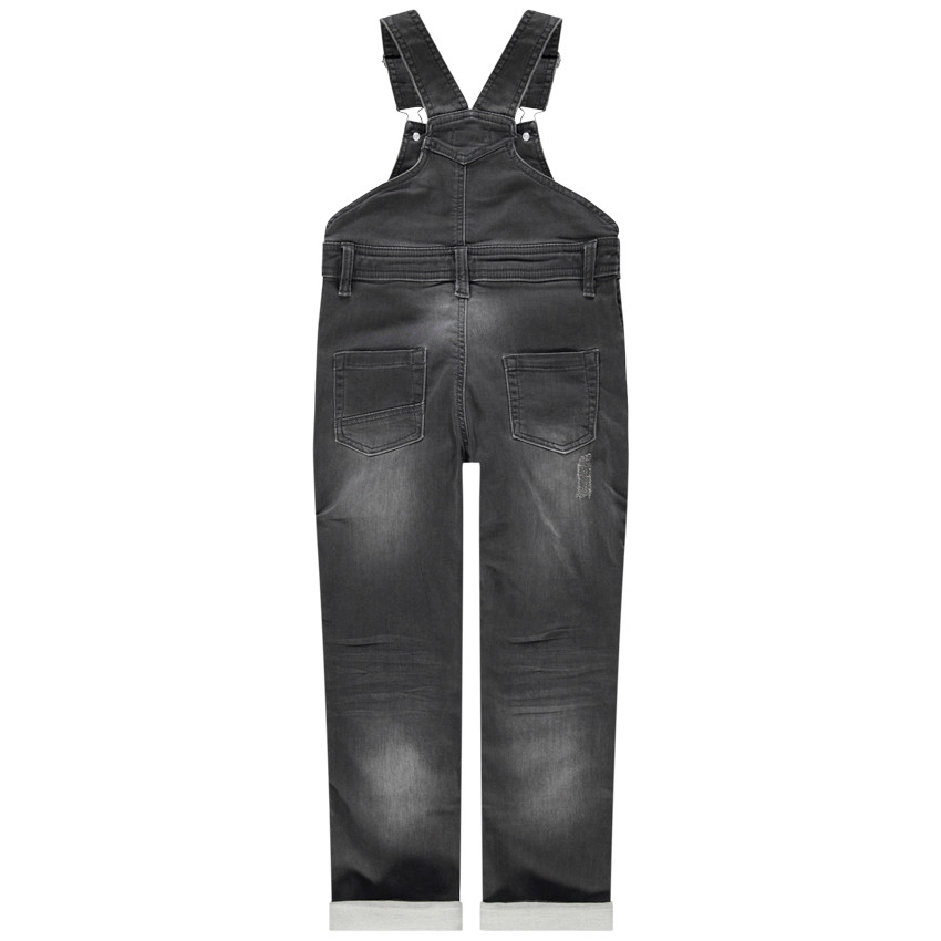 Salopette en jean effet used et crinkle avec prints et badges 