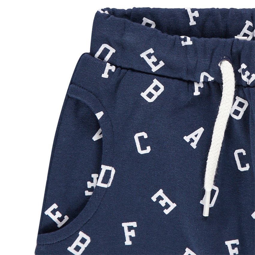 Pantalon de jogging en molleton forme sarouel avec lettres all-over 