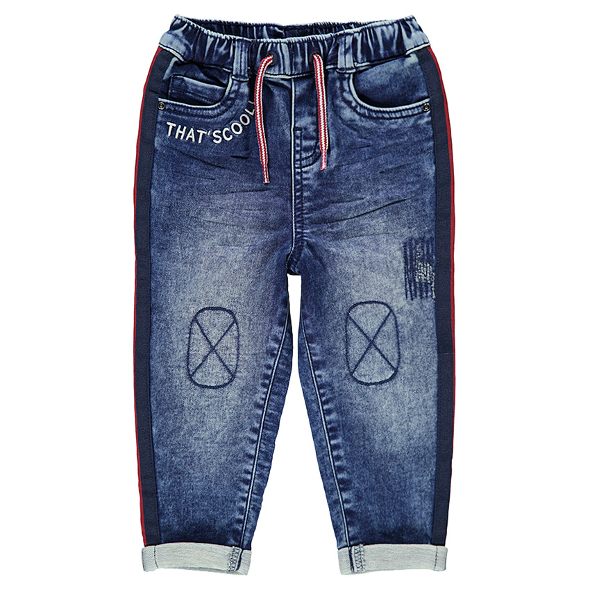 Jeans effet used élastiqué avec bandes contrastées sur les cotés 