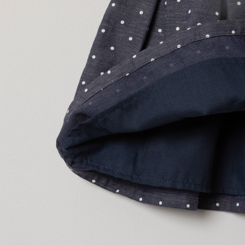 Robe sans manches à pois all-over et noeud  