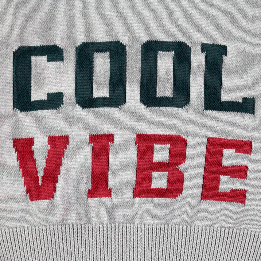 Junior - Pull en tricot avec inscriptions en jacquard et col zippé 