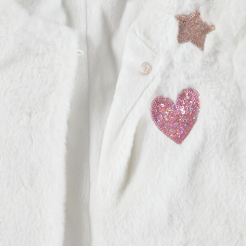 Veste courte en fausse fourrure 