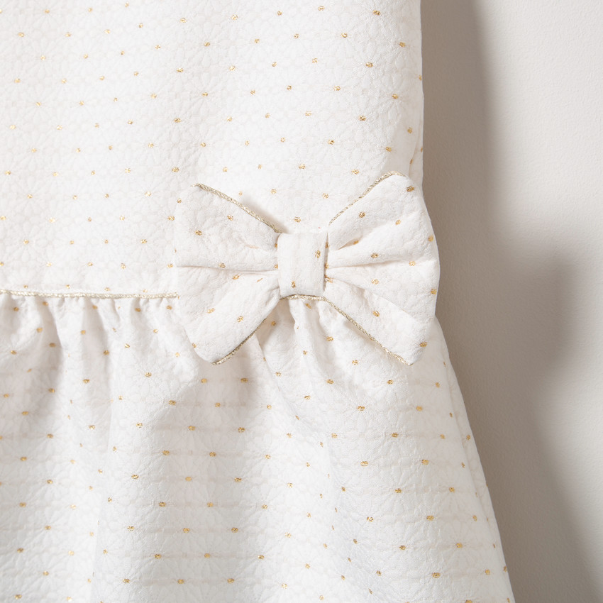 Robe sans manches à pois dorés et noeud 