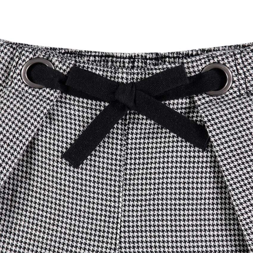 Short à motif pied de poule all-over et badge 