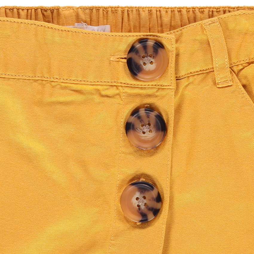 Jupe-short en voile à gros boutons effet écaille 
