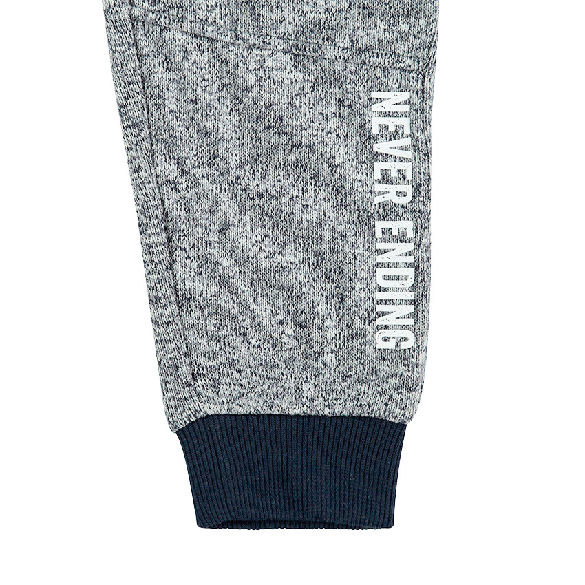 Pantalon de jogging en molleton avec poches zippées et découpes 