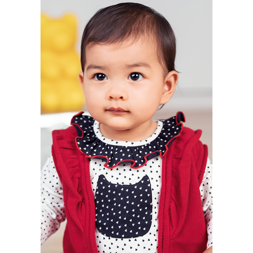 Ensemble avec tunique imprimée, gilet sans manches et legging printé 