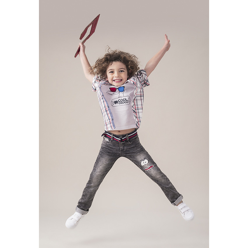 Jean souple effet used avec ceinture ajustable rayée 