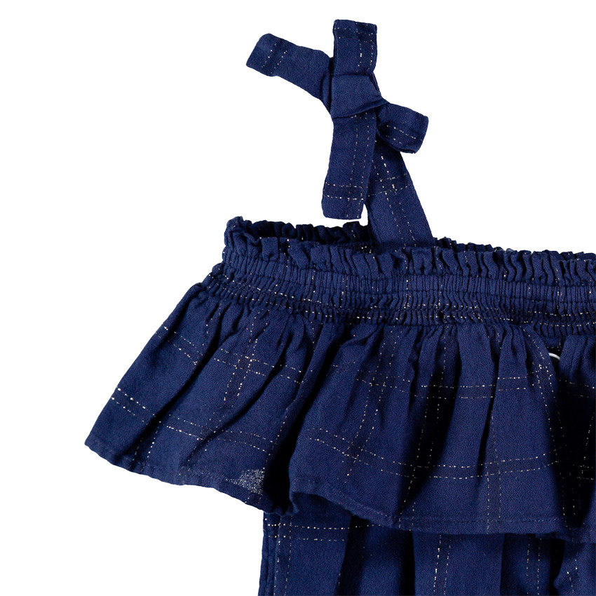 Salopette courte à carreaux brillants et bretelles nouées 