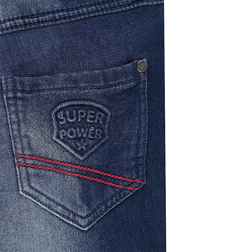 Jeans en denim like effet used avec déchirures et poches 