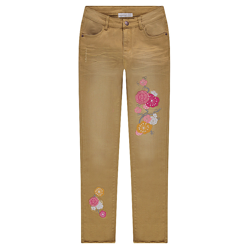 Jeans effet used et crinkle avec fleurs brodées 