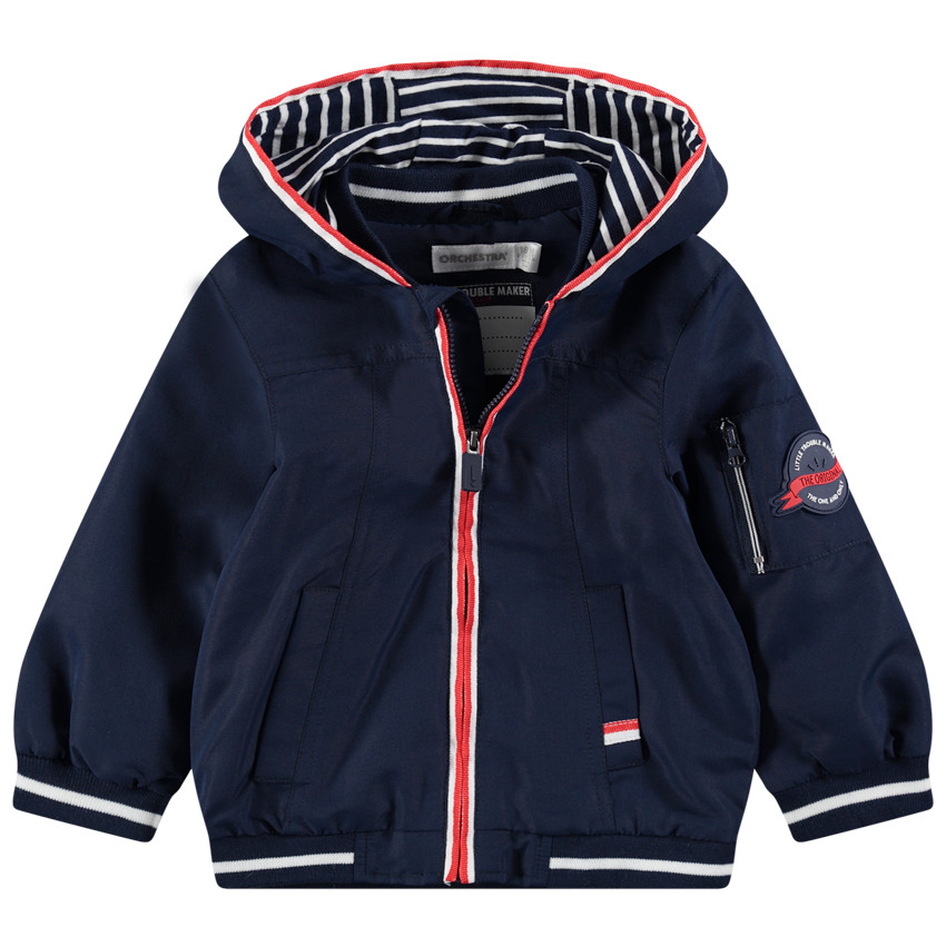 Coupe-vent uni avec doublure en jersey rayé et poches 