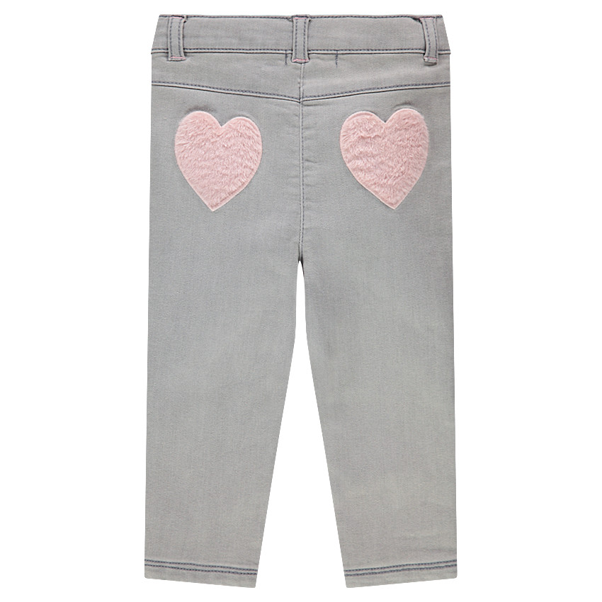 Jeans effet used avec coeurs en sherpa 